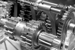 Partial view of gears in a machine in black and white